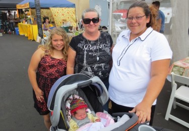 Baby's first day at the W. E. Farmers Market